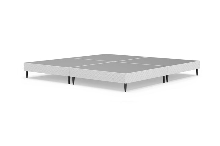 Angled view of platform bed frame without mattress